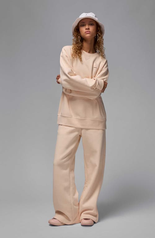 Shop Jordan Flight Fleece Crewneck Sweatshirt In Guava Ice