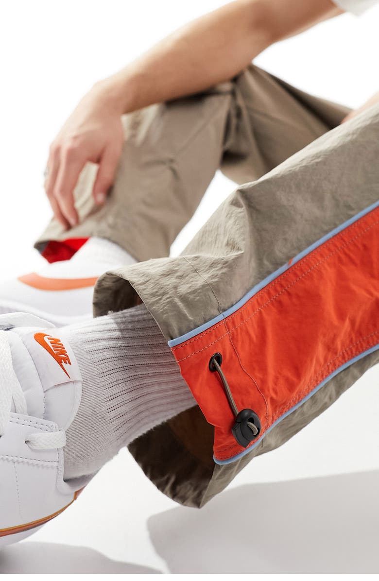 ASOS DESIGN Stripe Panel Nylon Wide Leg Drawstring Track Pants, Alternate, color,