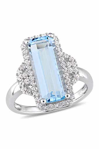 DELMAR Sterling Silver Sky Blue Emerald Cut Topaz & White Topaz Ring