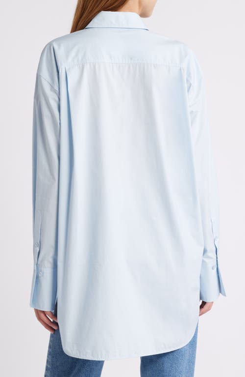 Shop Frame The Oversize Cotton Button-up Shirt In Light Chambray
