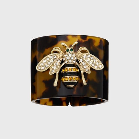 Stripey bee resin napkin rings, set of four