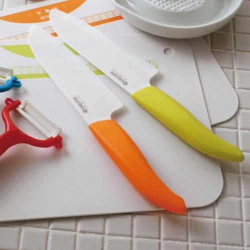 Kyocera Revolution Ceramic 5-1/2 Inch Santoku Knife In Orange