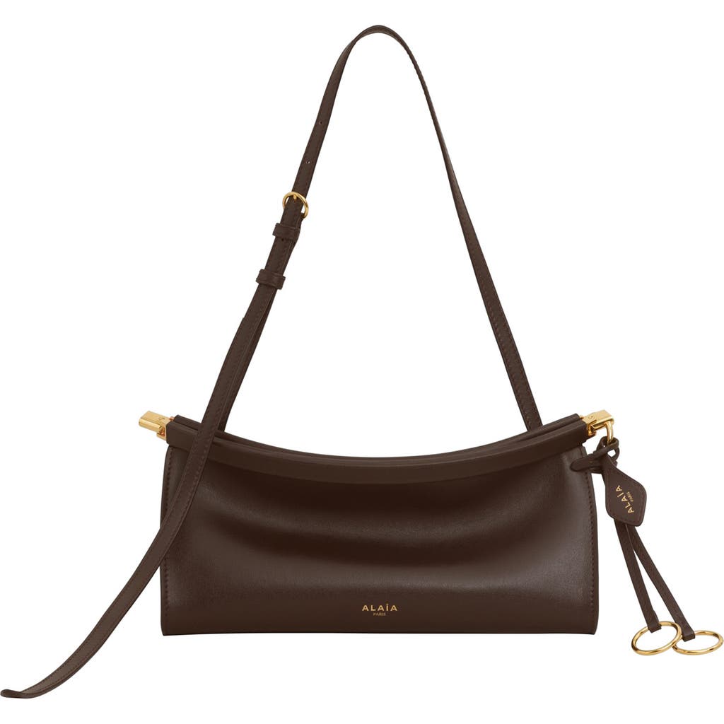 Shop Alaïa Small Le Click East/west Leather Shoulder Bag In Marron Fonce