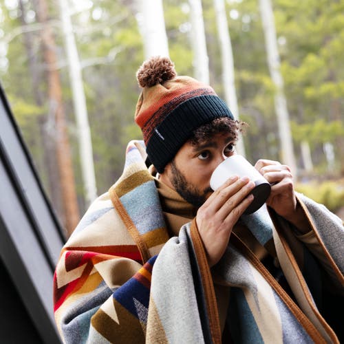 Turtle Fur Fade Cuffed Pom Winter Hat In Brown