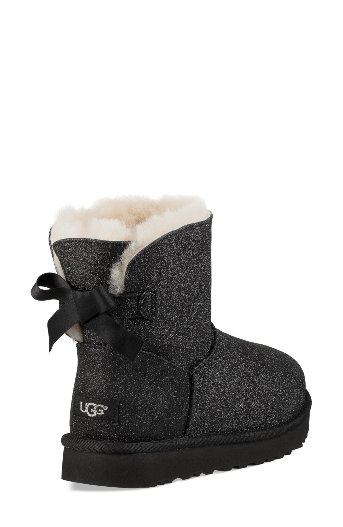 UGG<sup>®</sup> Mini Bailey Bow Sparkle Genuine Shearling Boot, Alternate, color, 
