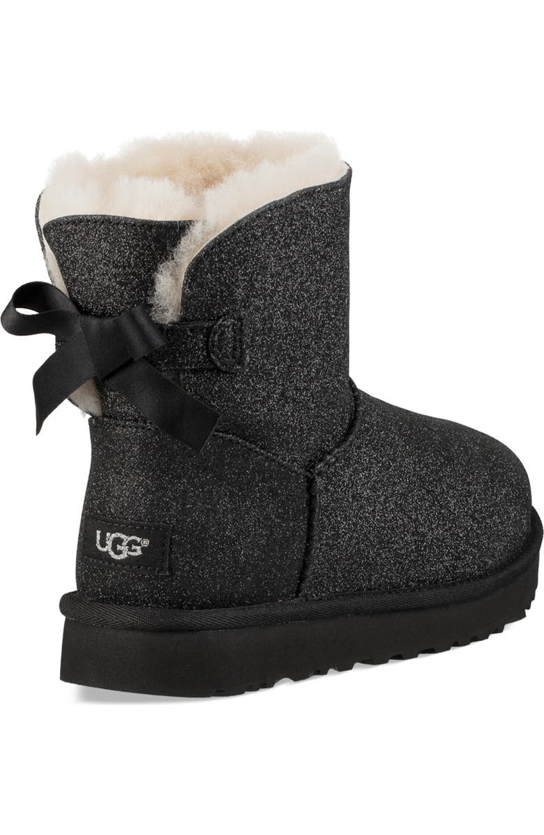 UGG<sup>®</sup> Mini Bailey Bow Sparkle Genuine Shearling Boot, Alternate, color,