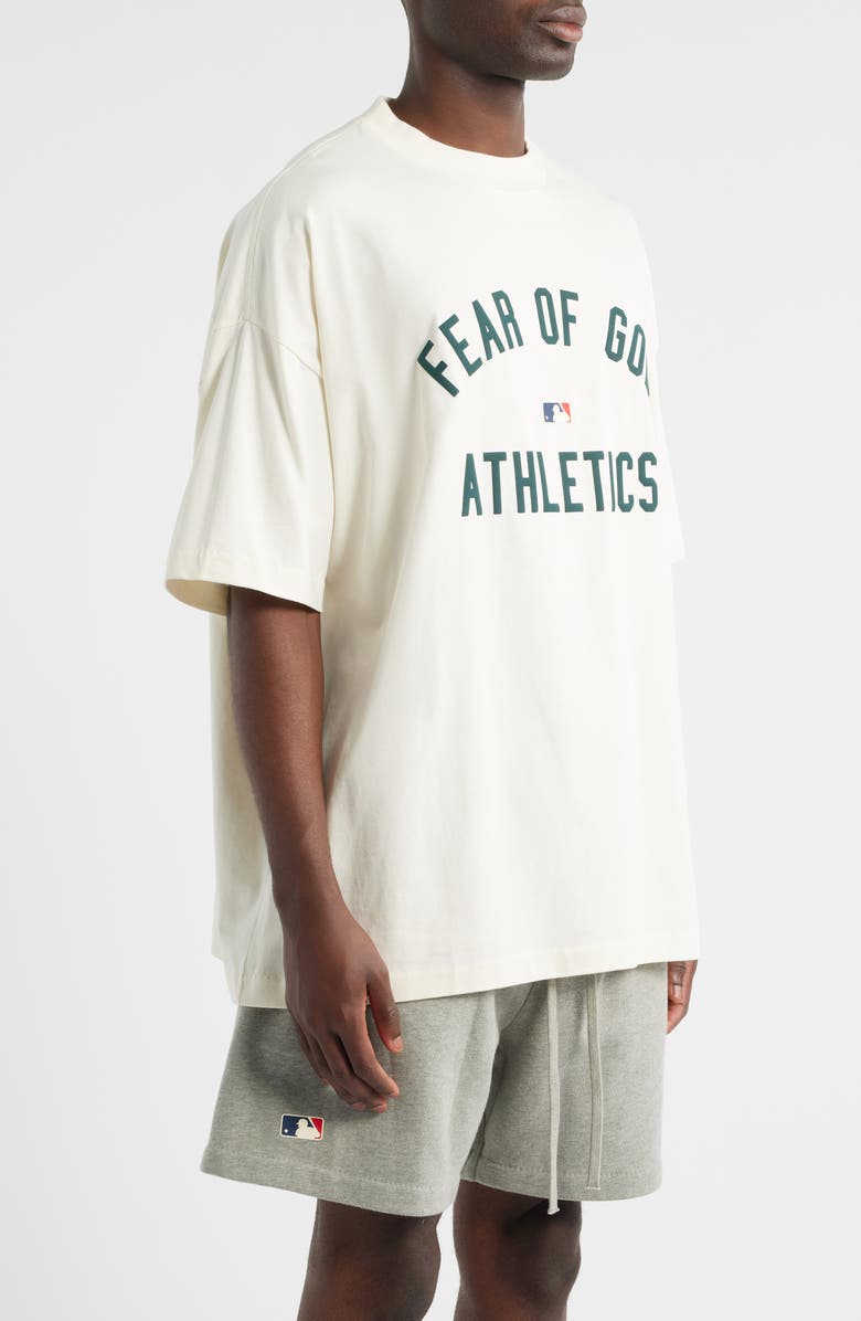 Fear of God Essentials MLB Athletics '90s Fit Cotton Graphic T-Shirt, Alternate, color, Cream White