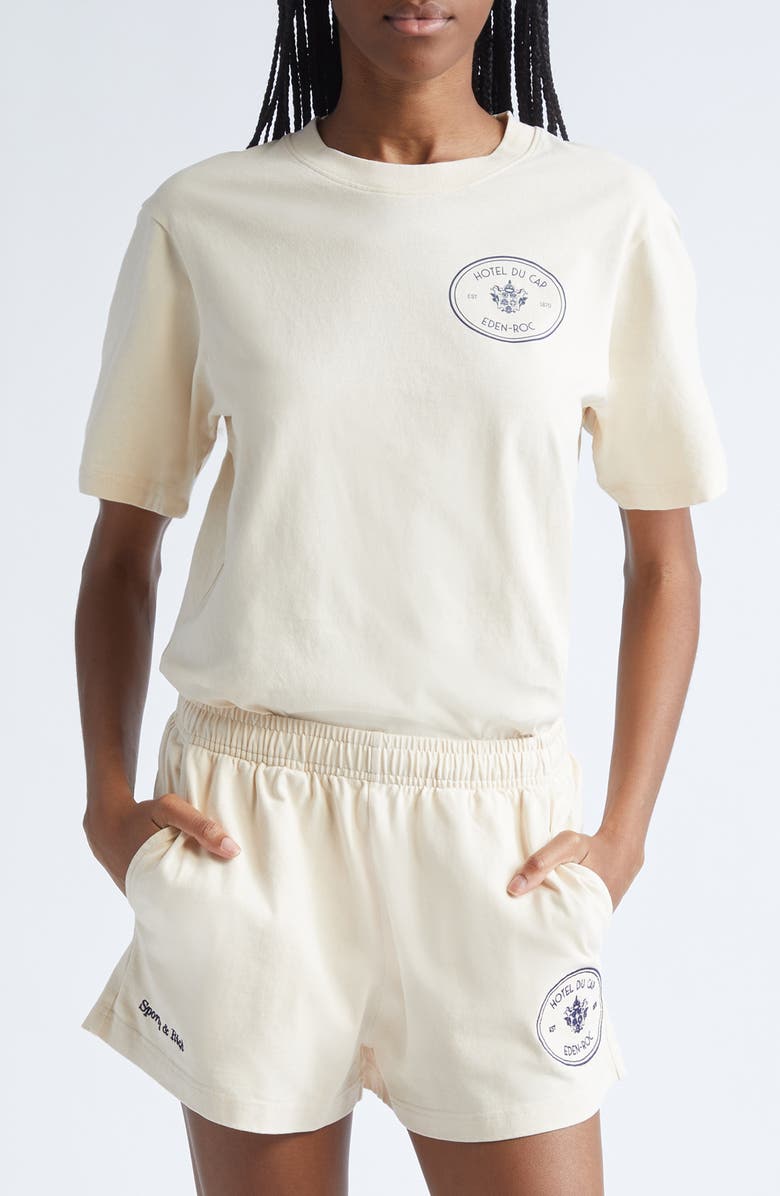 Sporty & Rich Kennedy Crest Cotton Graphic T-Shirt, Main, color, Cream