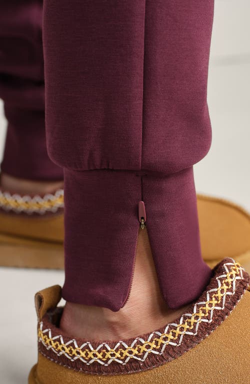 Rhone Dreamglow Tapered Pants In Burgundy