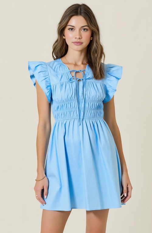 Modenaire Smocked Mini Dress With Ruffle Sleeves And Front Tie Detail