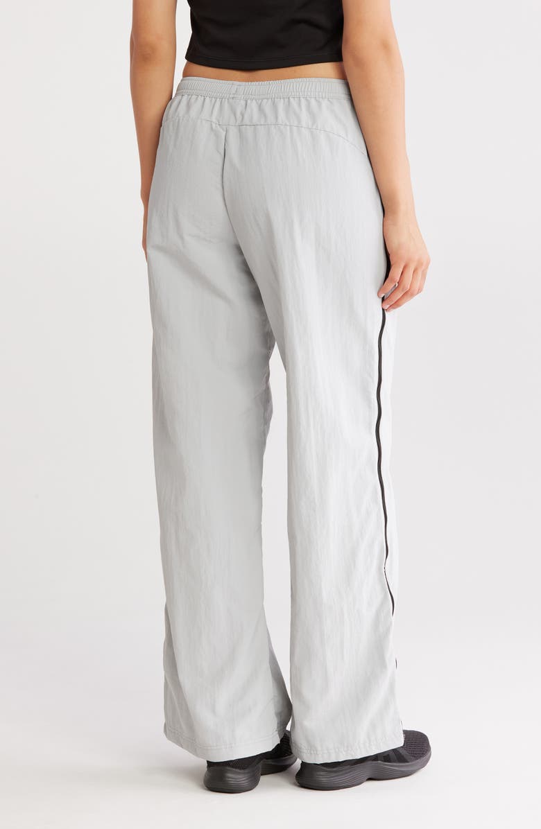 PUMA Dare To Relaxed Woven Zip-Off Pants, Alternate, color,