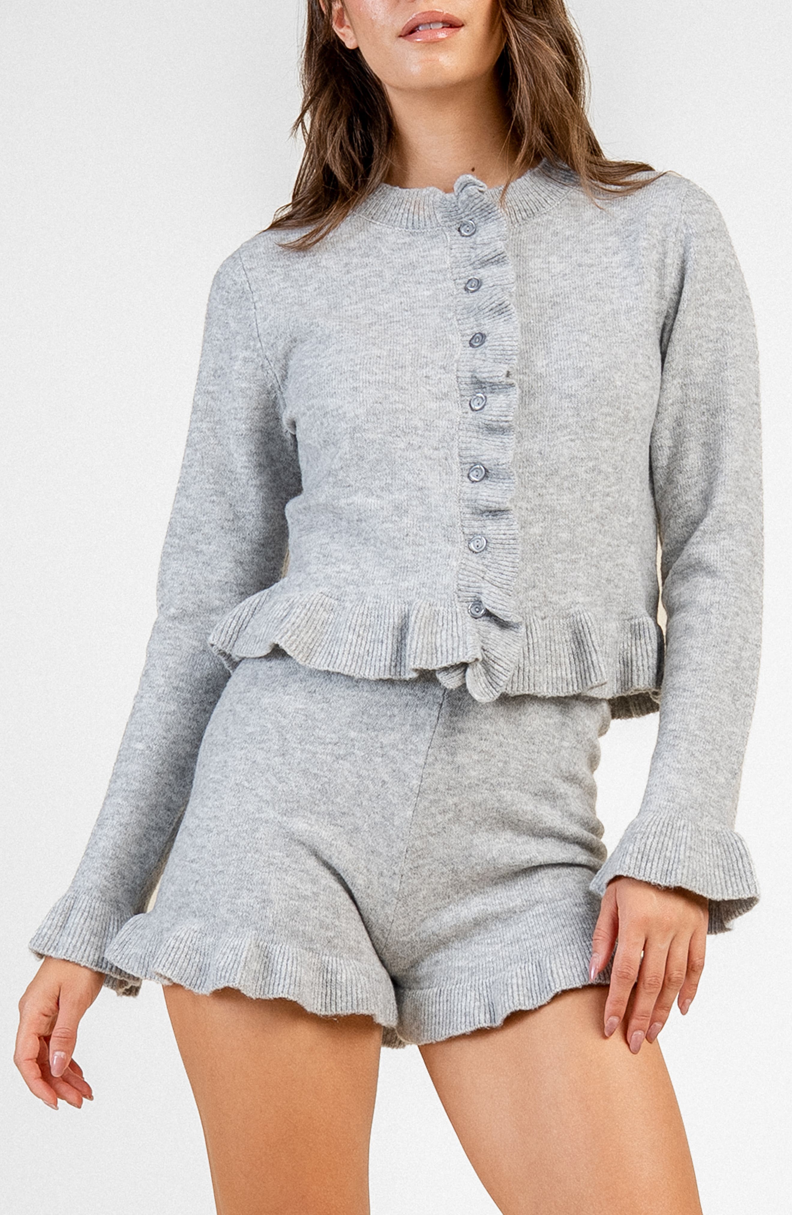 Ruffle Trim Peplum Cardigan