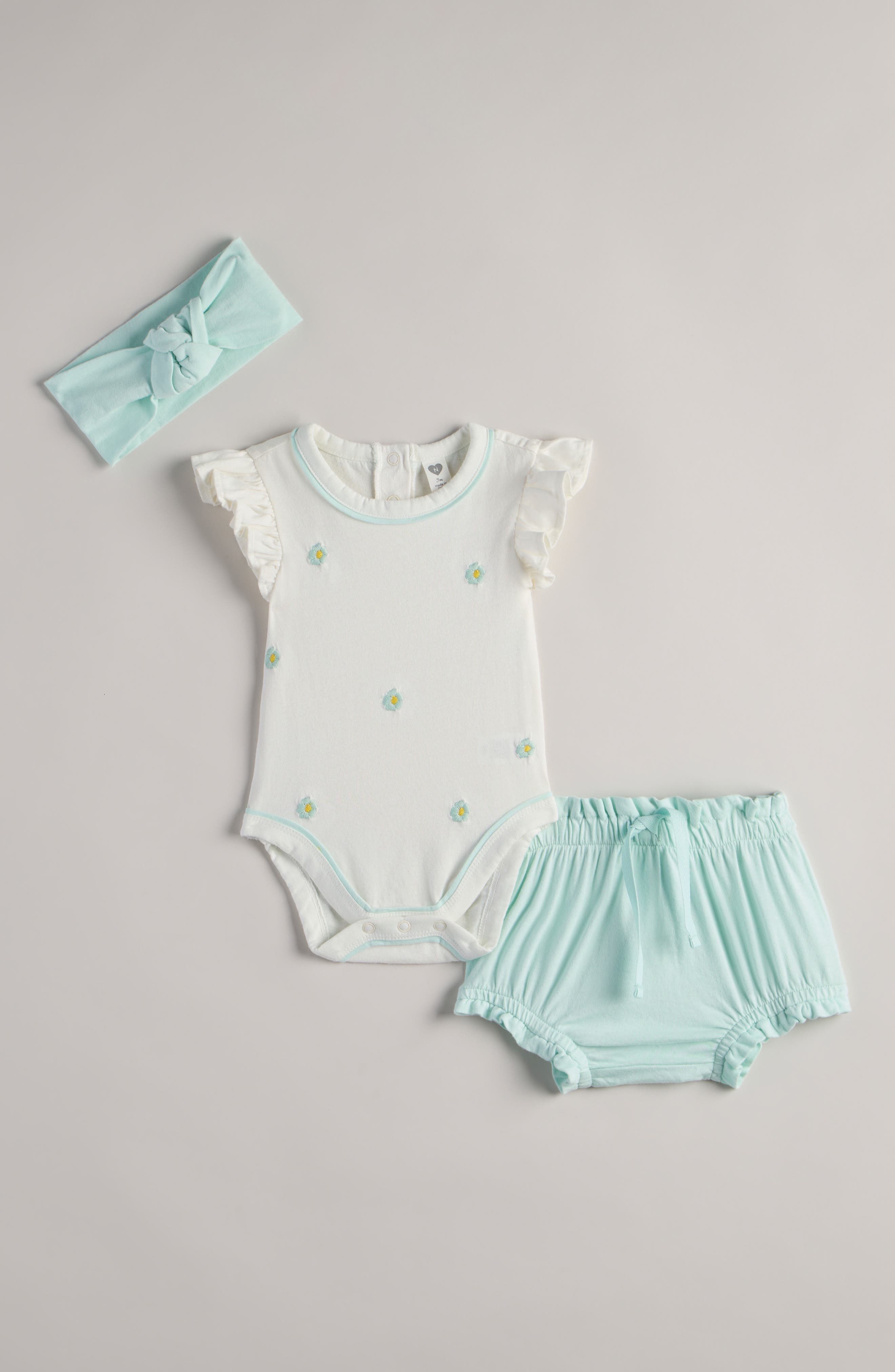 IVORY FLOWERS- TEAL