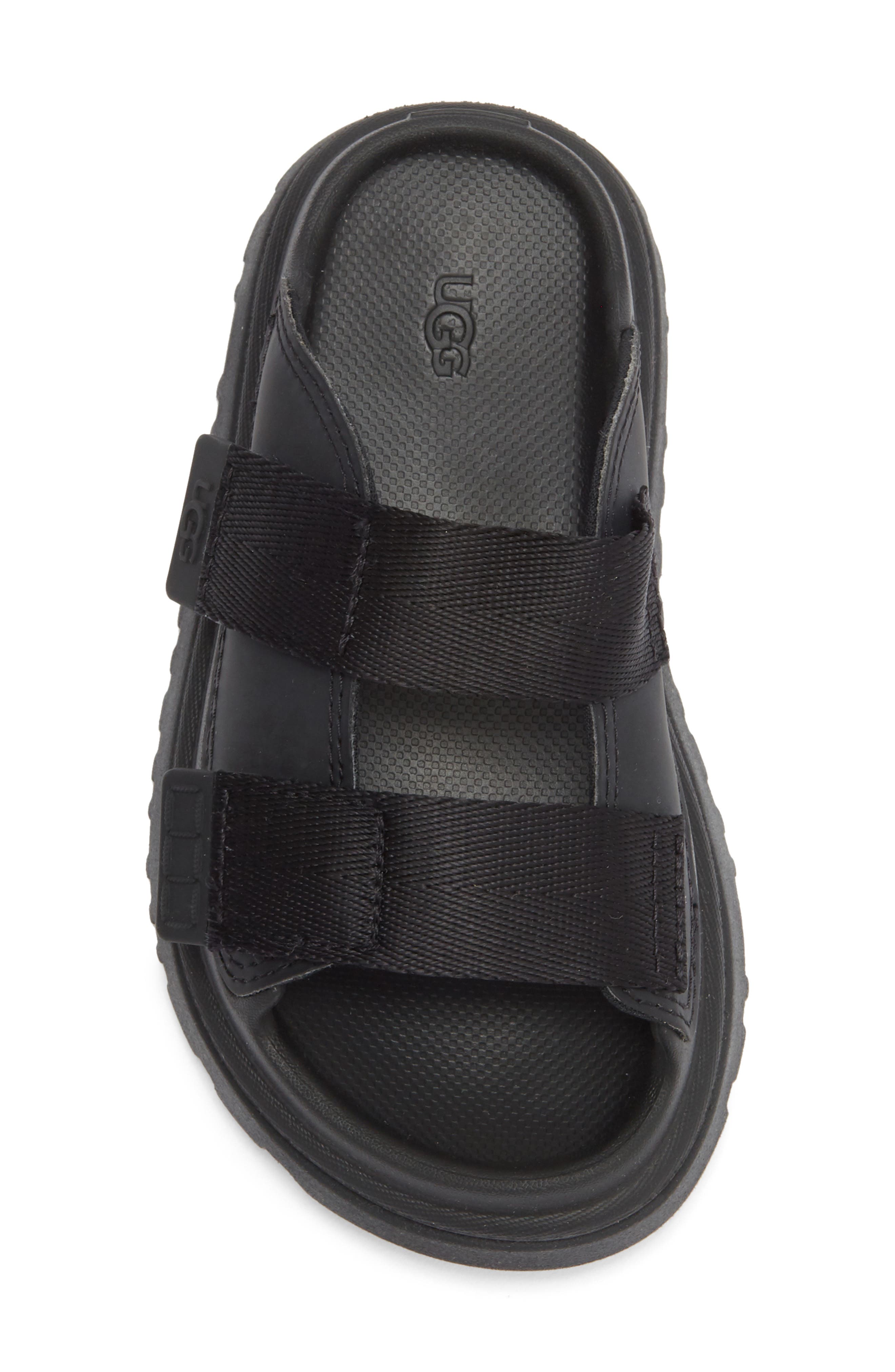 UGG<sup>®</sup> Kids' GoldenGlow Slide Sandal, Alternate, color, Black