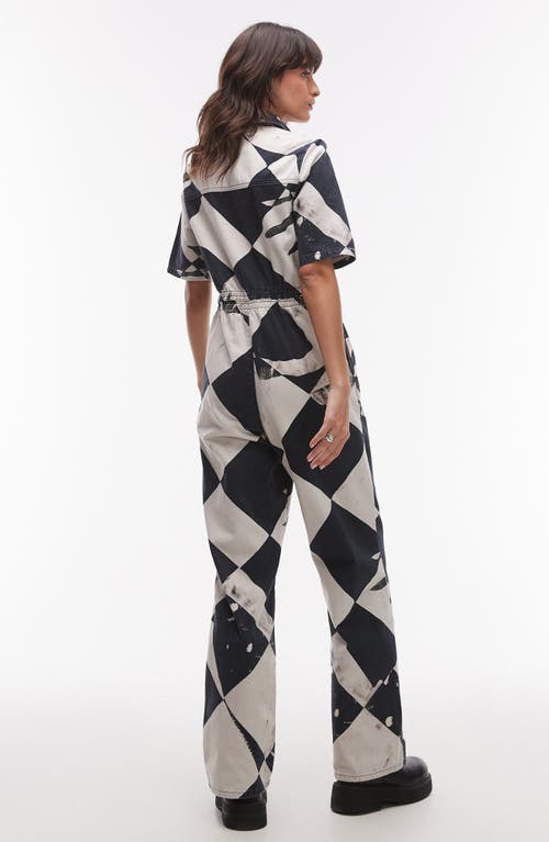 Shop Topshop Distressed Geo Print Cotton Jumpsuit In Black Multi