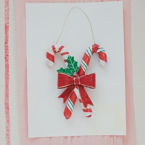 Iron & Paper Mache Glitter Candy Cane Wall Decor with Festive Bow
