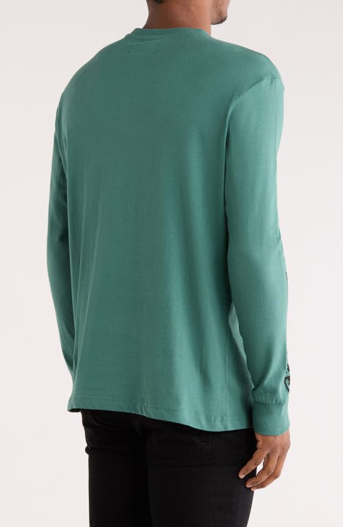 Cat Wwr Destructed Logo Long Sleeve T-shirt In Green