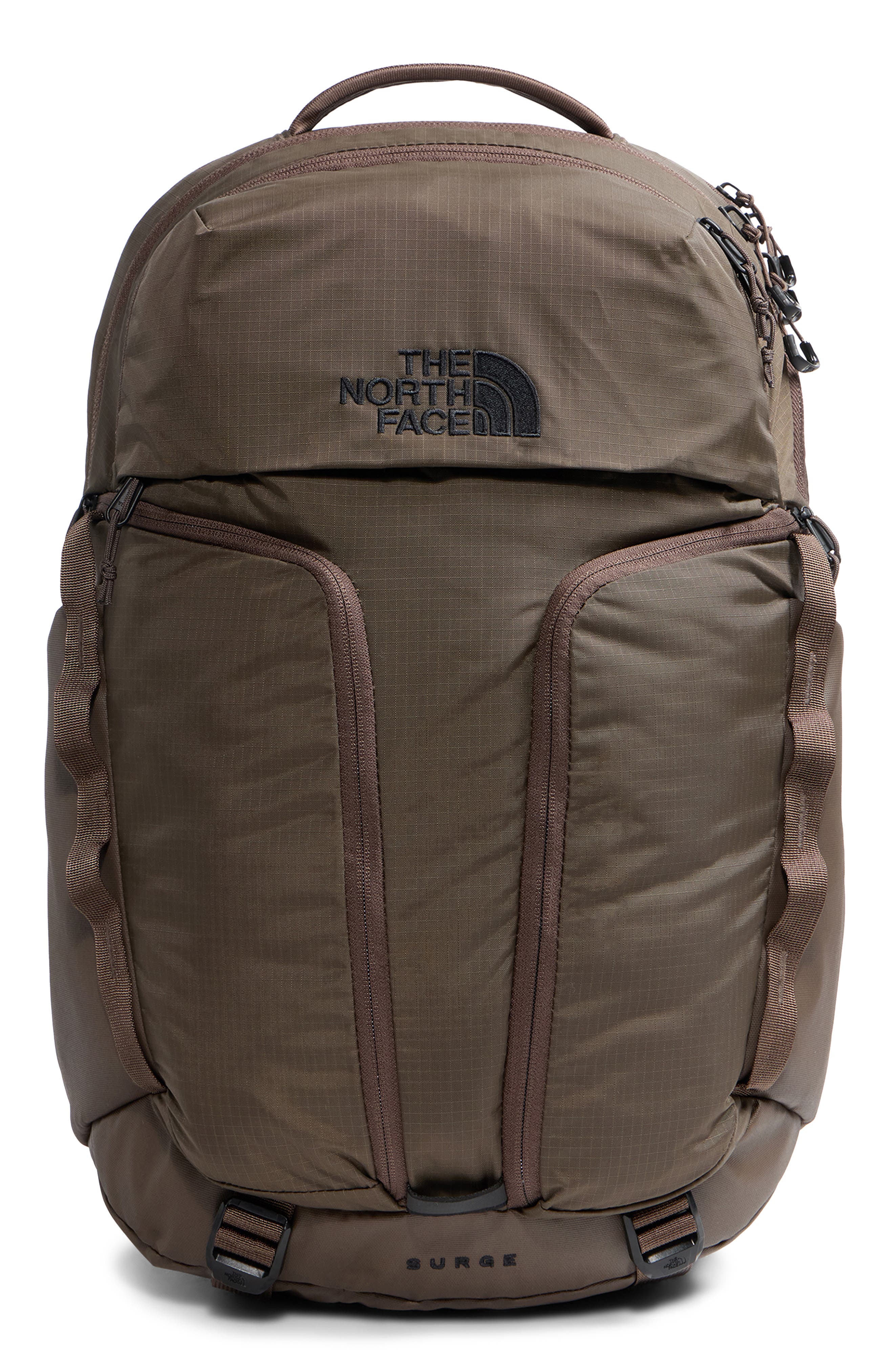 is the north face surge backpack waterproof Surge, Tin Grey Dark Heather/TNF Black-NPF, OS : Electronics Its lightweight build makes it easy to carry The North Face Surge Commuter