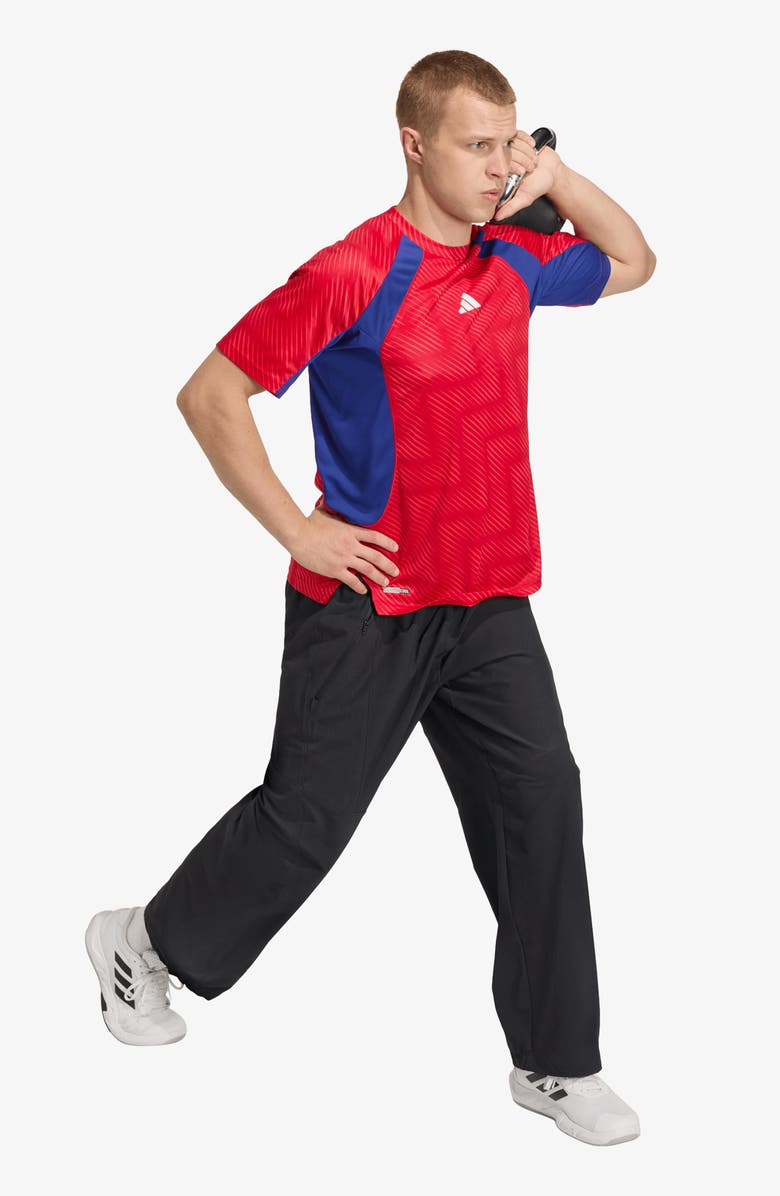 adidas FIFA World Cup 26<sup>™</sup> T-Shirt, Alternate, color, Pure Ruby/ Mystery Ink/ Print