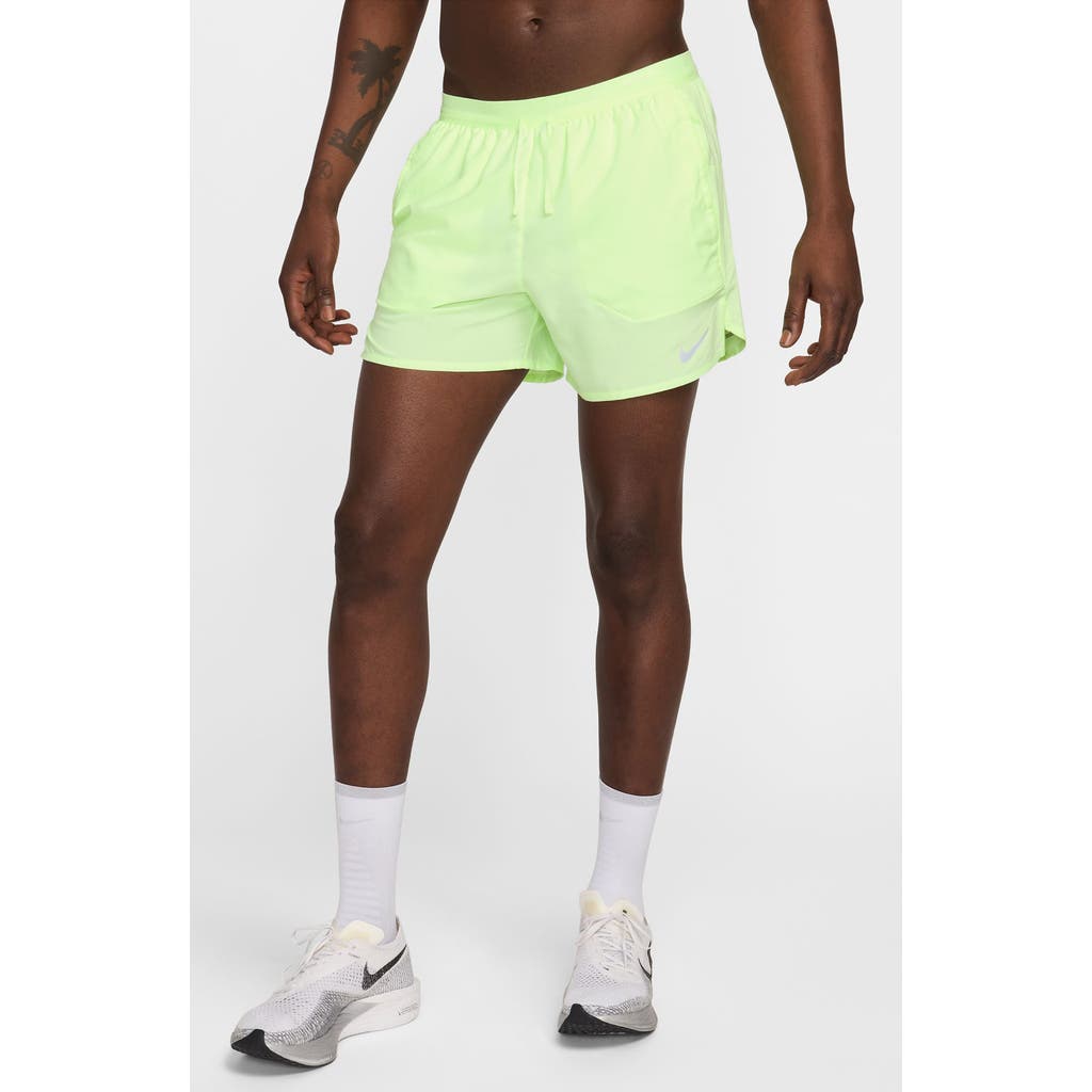 Nike Dri-fit Stride 5-inch Running Shorts In Green