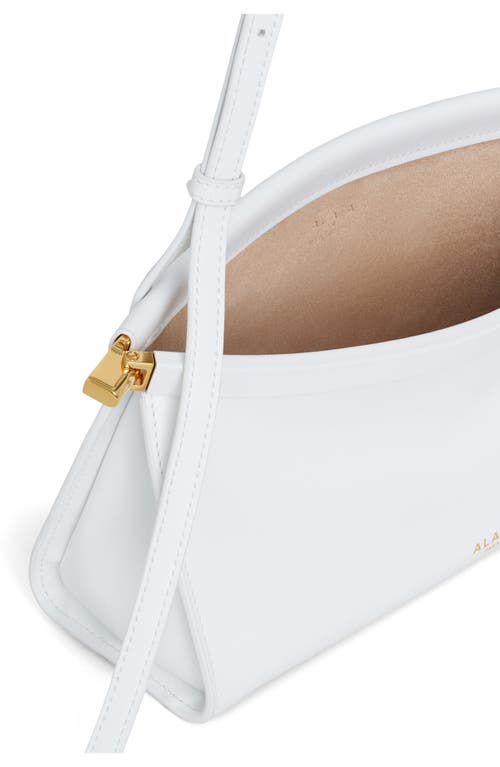 Shop Alaïa Small Le Click East/west Leather Shoulder Bag In Blanc Optique
