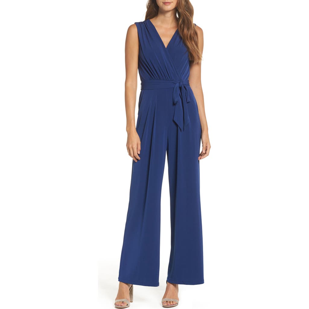 Shop Vince Camuto Faux Wrap Jersey Jumpsuit In Blue