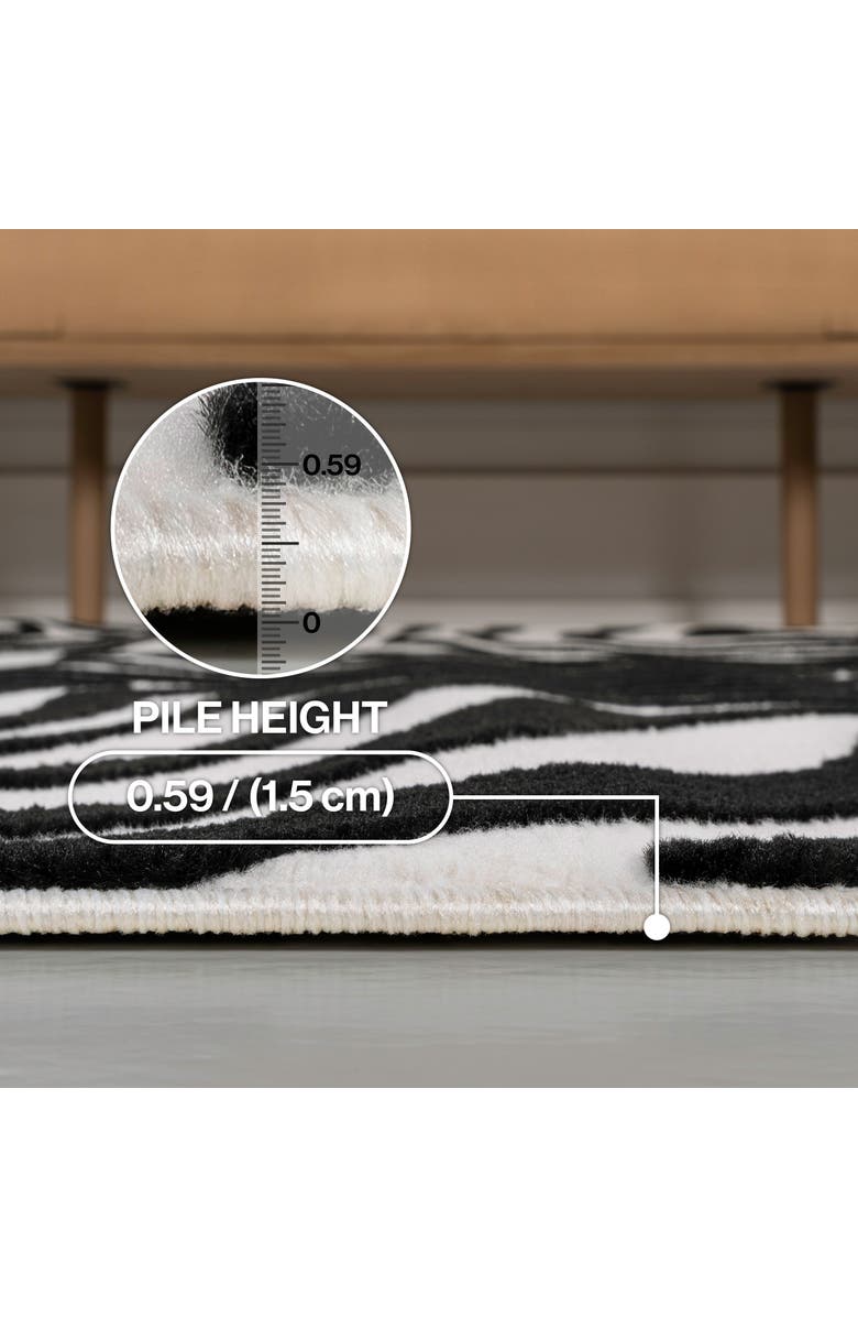 JONATHAN Y Maribo High-Low Abstract Groovy Striped Indoor/Outdoor Area Rug, Alternate, color, Black/White