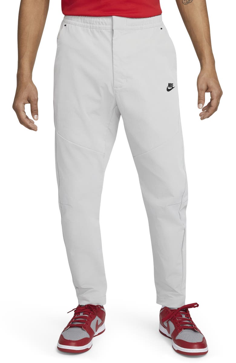 Nike Sportswear Tech Essentials Commuter Pants, Main, color, 