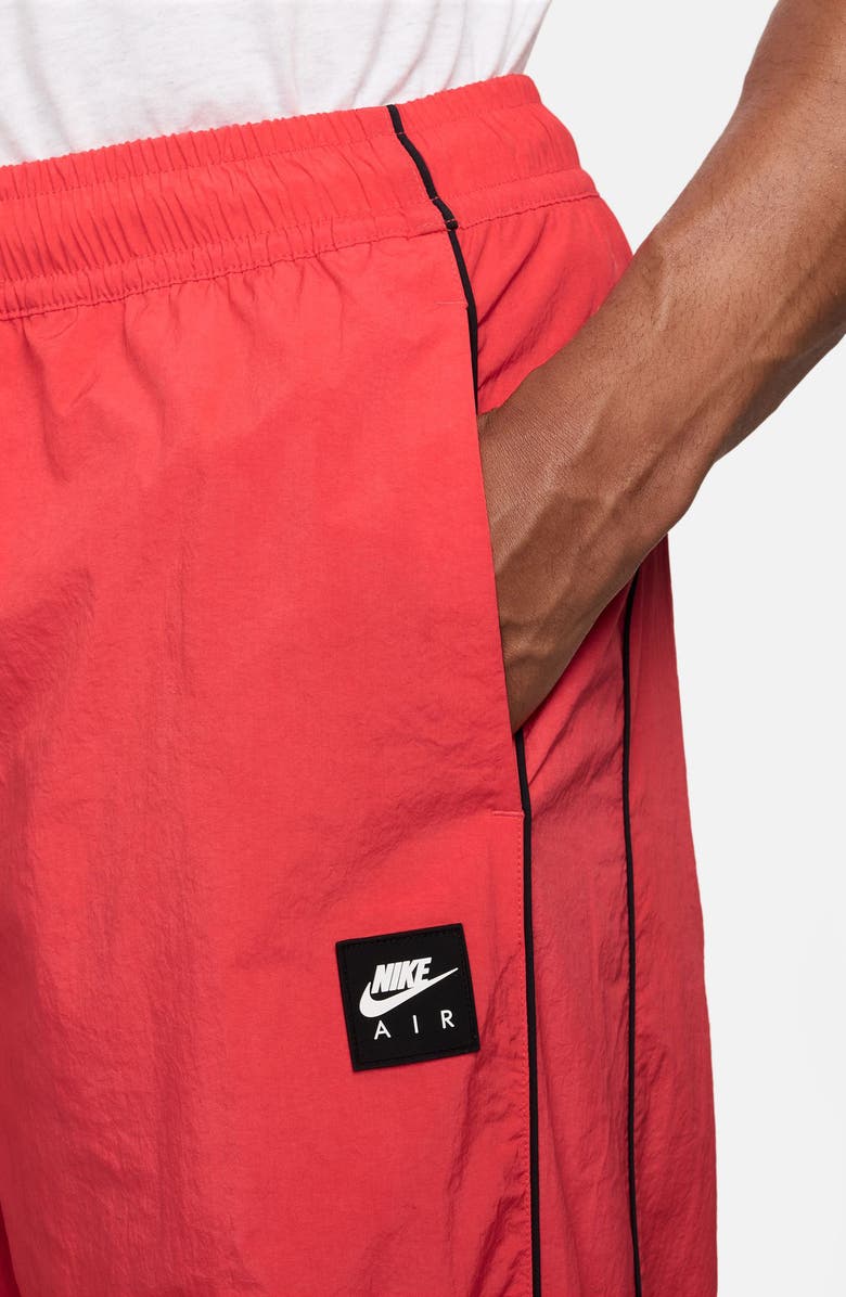 Nike Sportswear Air Water Repellent Track Pants, Alternate, color, Light Crimson