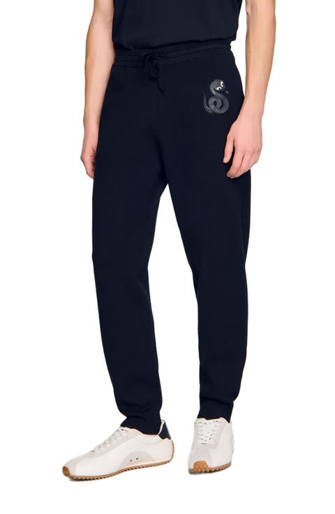 Joggers with snake detail