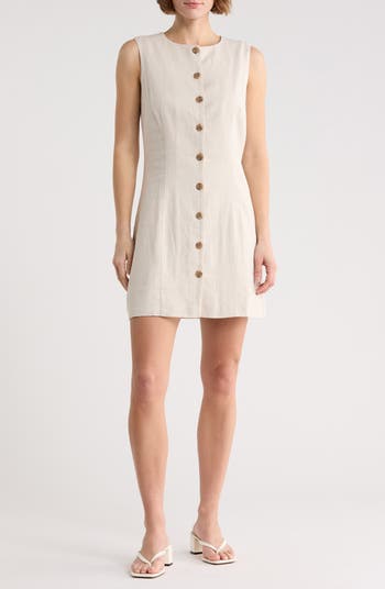 beige floral dress with sleeves Beige linen shirt dress with mother of pearl buttons and pockets