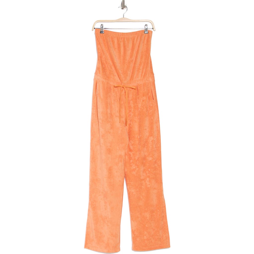 Shop Beyond Yoga Tropez Strapless Jumpsuit In Orange Dream