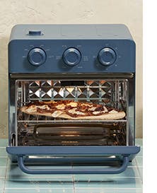 A combination air fryer and toaster oven.