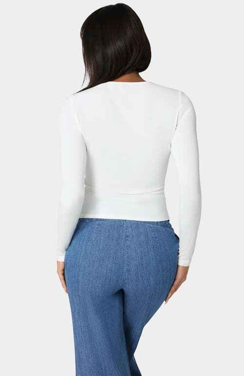 Bebe Cut Out Flower Long Sleeve Top In White