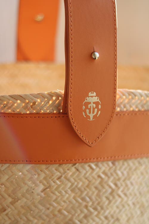 Lastelier Borneo Leather And Straw Bag In Orange