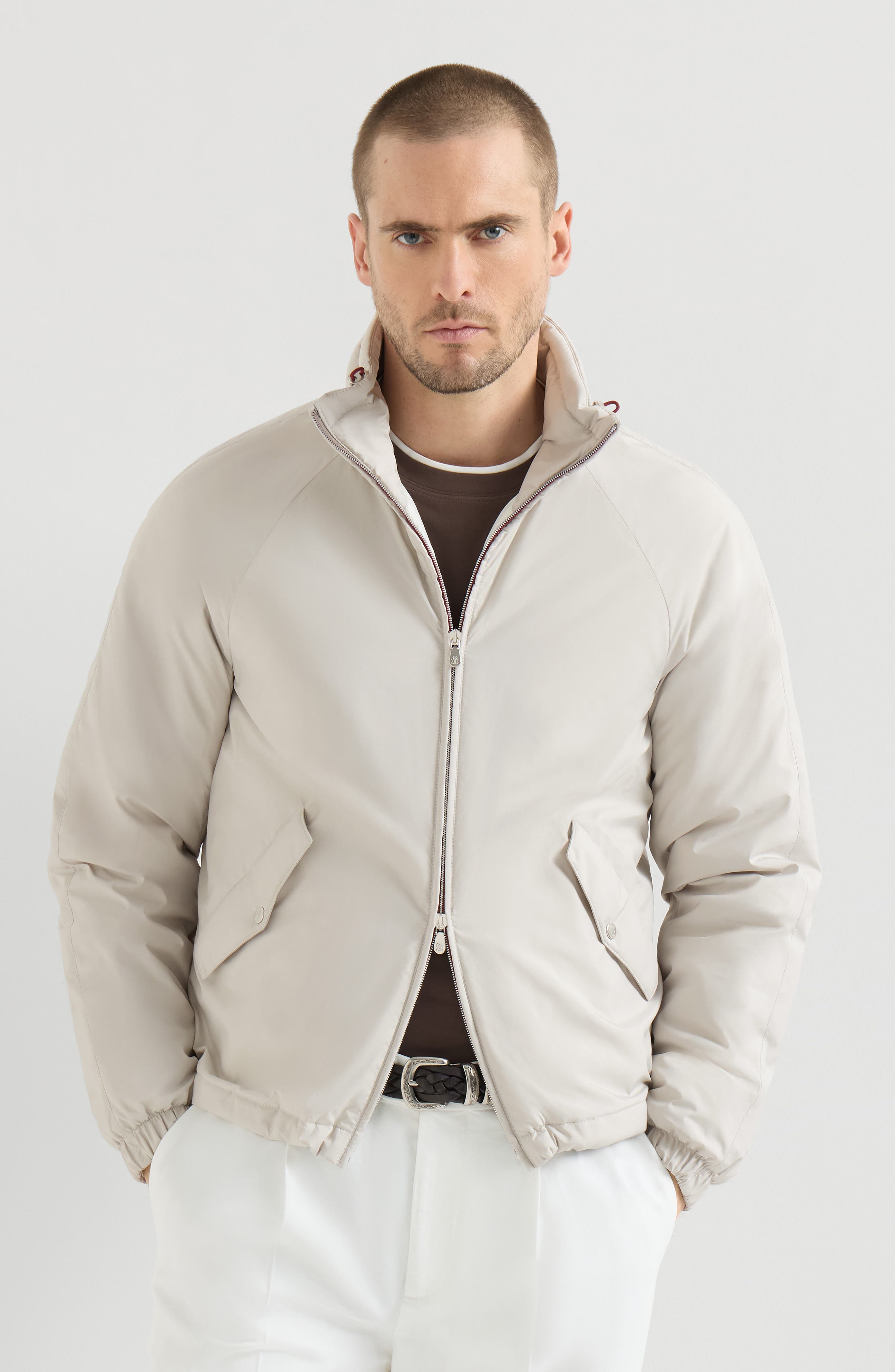 Outerwear jacket with packable hood