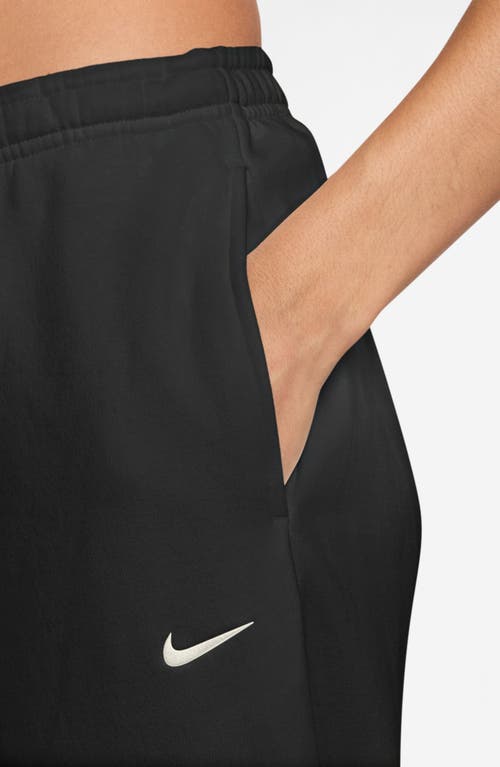 Nike Phoenix Fleece Loose Crop Barrel Pants In Black