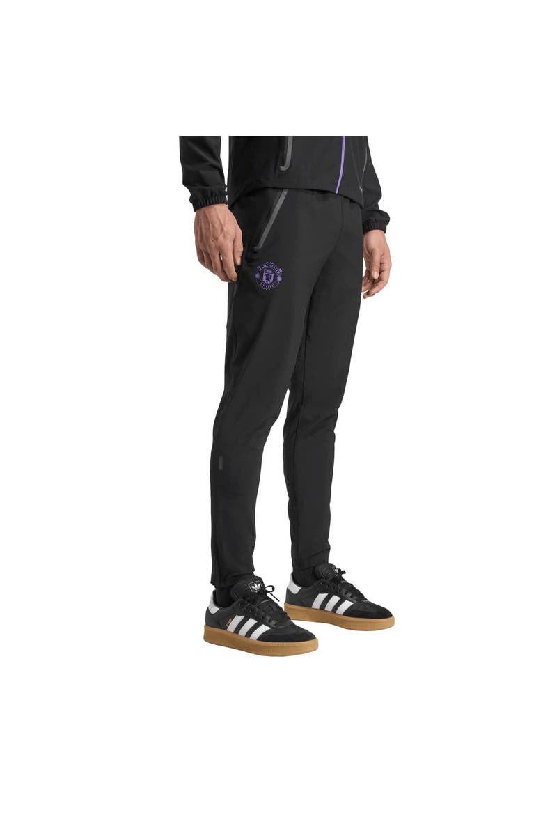 Men's adidas Black Manchester United 2025/26 Tiro Vis Tech Travel Pants, Main, color, Black