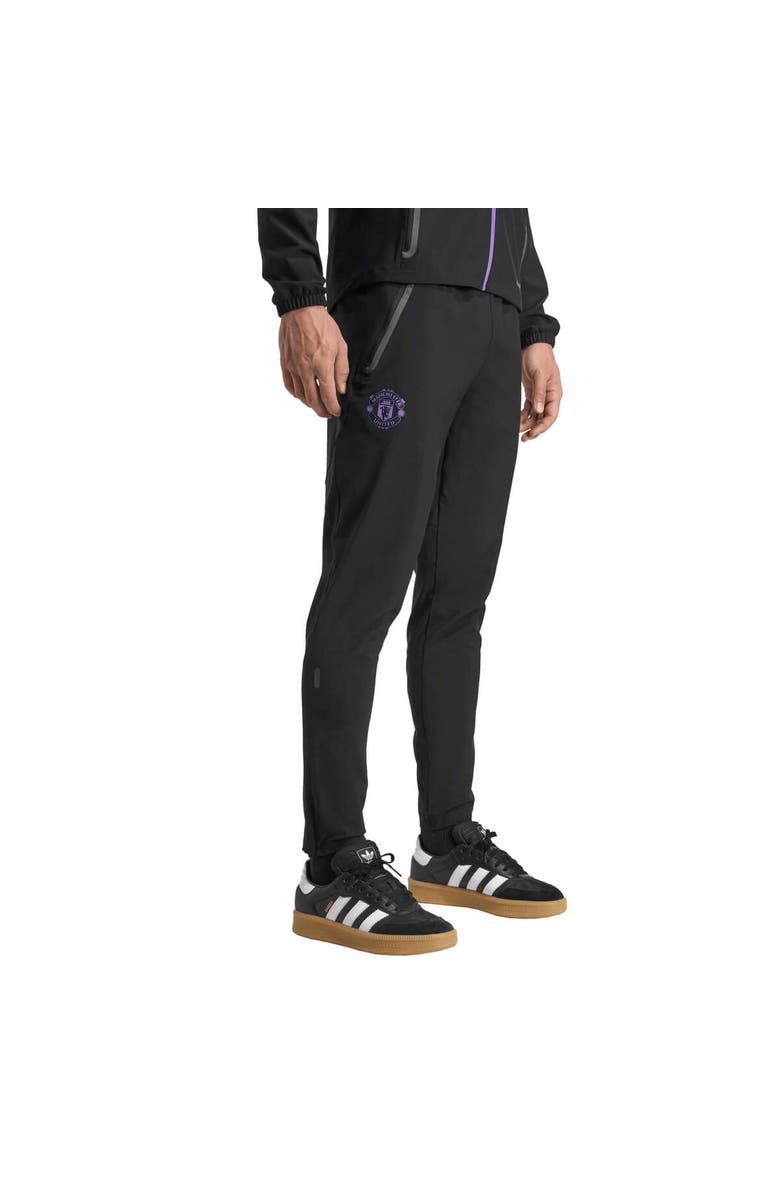 adidas Men's adidas Black Manchester United 2025/26 Tiro Vis Tech Travel Pants, Main, color, Black