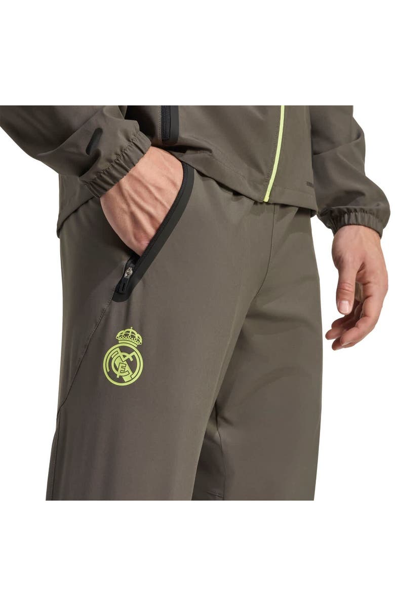 adidas Men's adidas Olive Real Madrid 2025/26 Tiro Vis Tech Travel Pants, Alternate, color, Olive