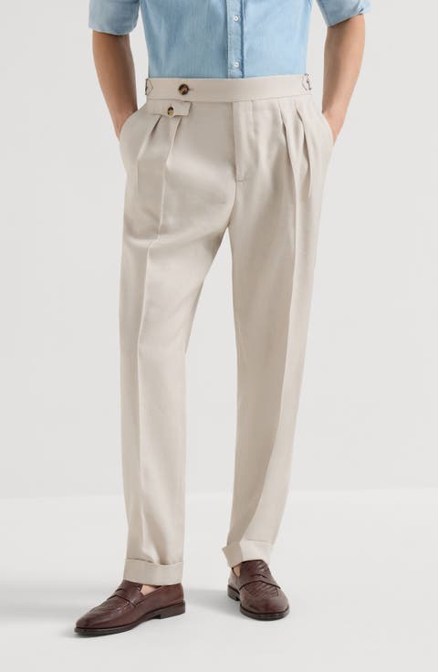 Trousers with double pleats and tabs