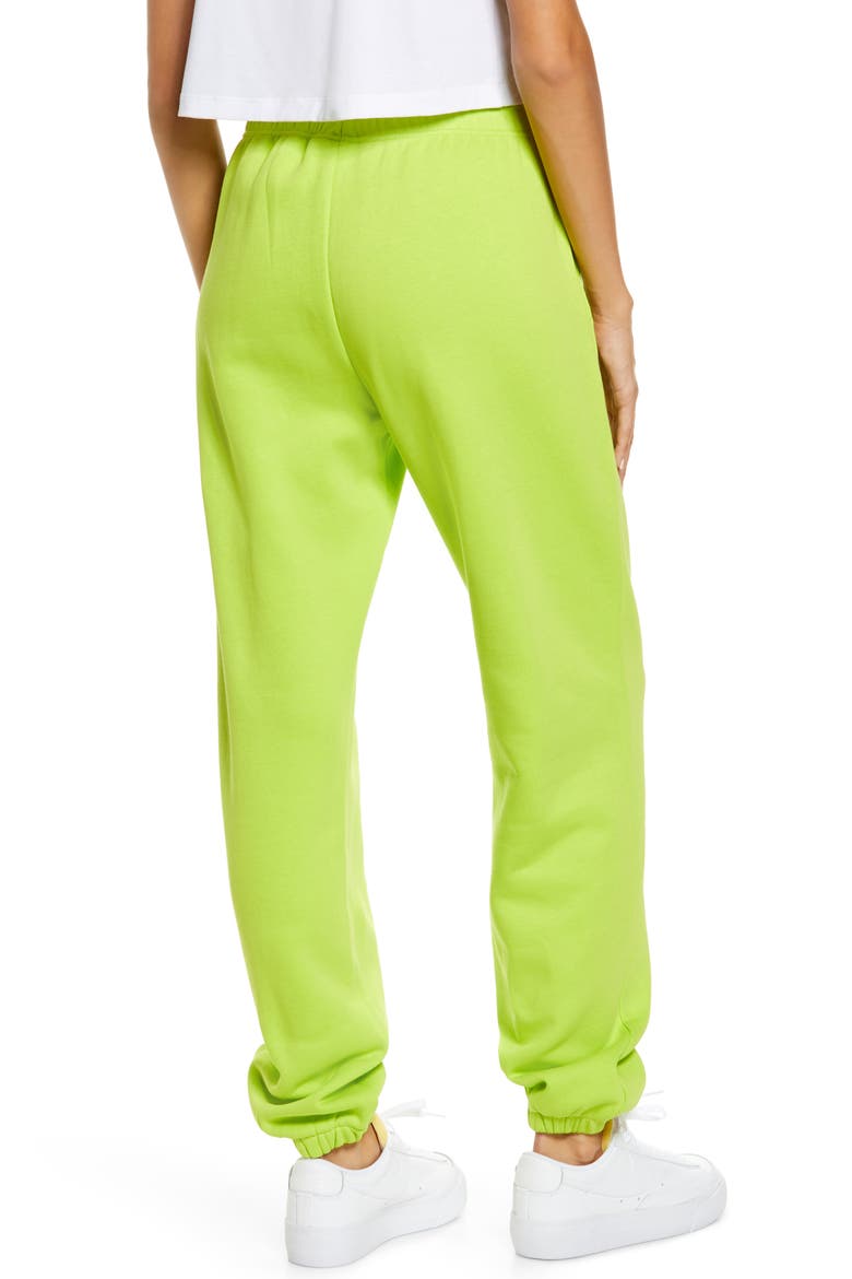 Sportswear Essential Fleece Pants, Alternate, color, 321 ATOMIC GREEN/ WHITE