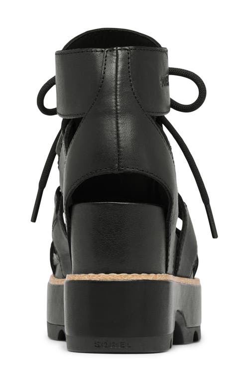 Sorel Joanie Iv Lace Wedge Sandal In Black/black