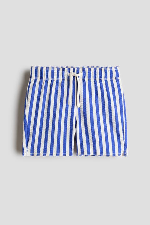 Patterned swim shorts