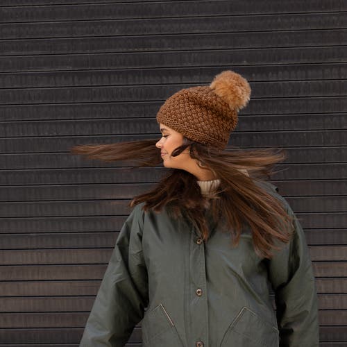 Turtle Fur Snowfall Pom Slouch Beanie In Brown