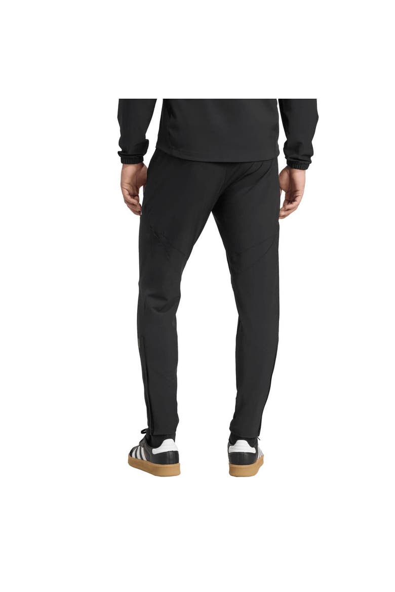 Men's adidas Black Manchester United 2025/26 Tiro Vis Tech Travel Pants, Alternate, color, Black