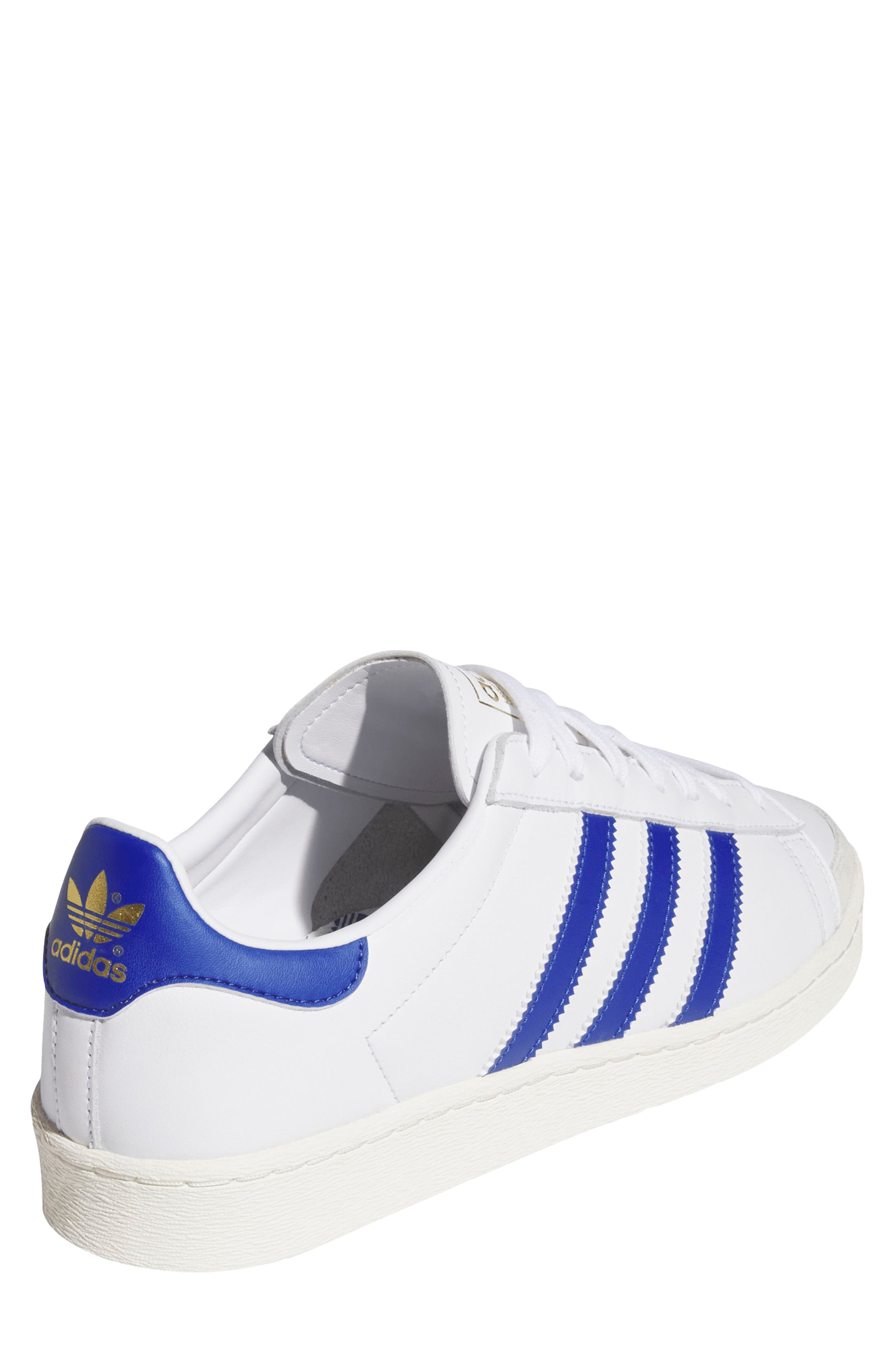 adidas Gender Inclusive Jabbar Low Sneaker, Alternate, color, Ftwr White/ Colour/ Off White