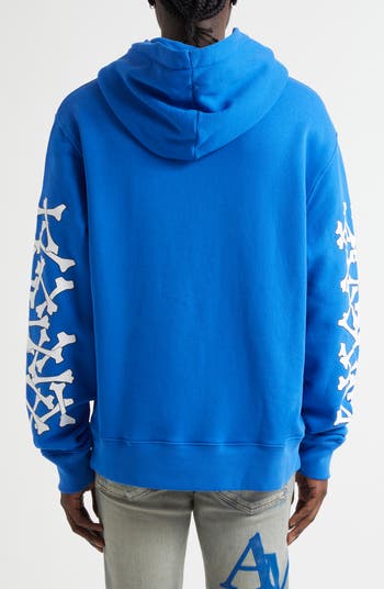 【AMIRI】Bones Stacked グラフィックパーカー AMIRI Bones Stacked パーカー | レッド | FARFETCH JP