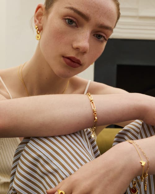Ottoman Hands Garnet Heart Huggie Earrings In Gold