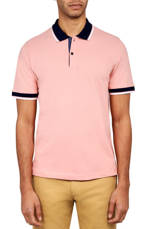 Construct Solid Pique Polo In Salmon